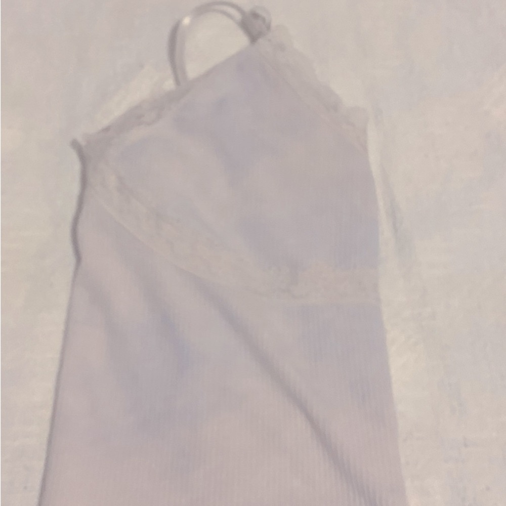 Three women’s tops. Tank top Cardigan Sweater